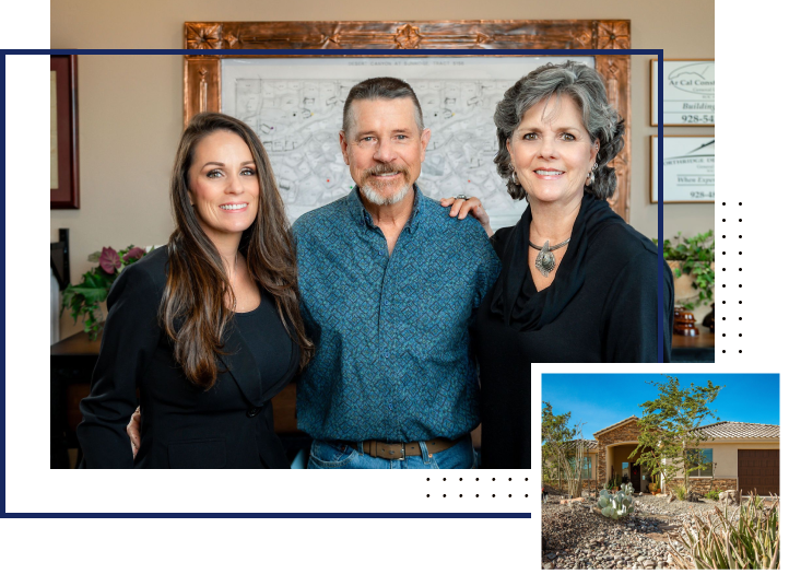 A family posing for a picture in front of their home.