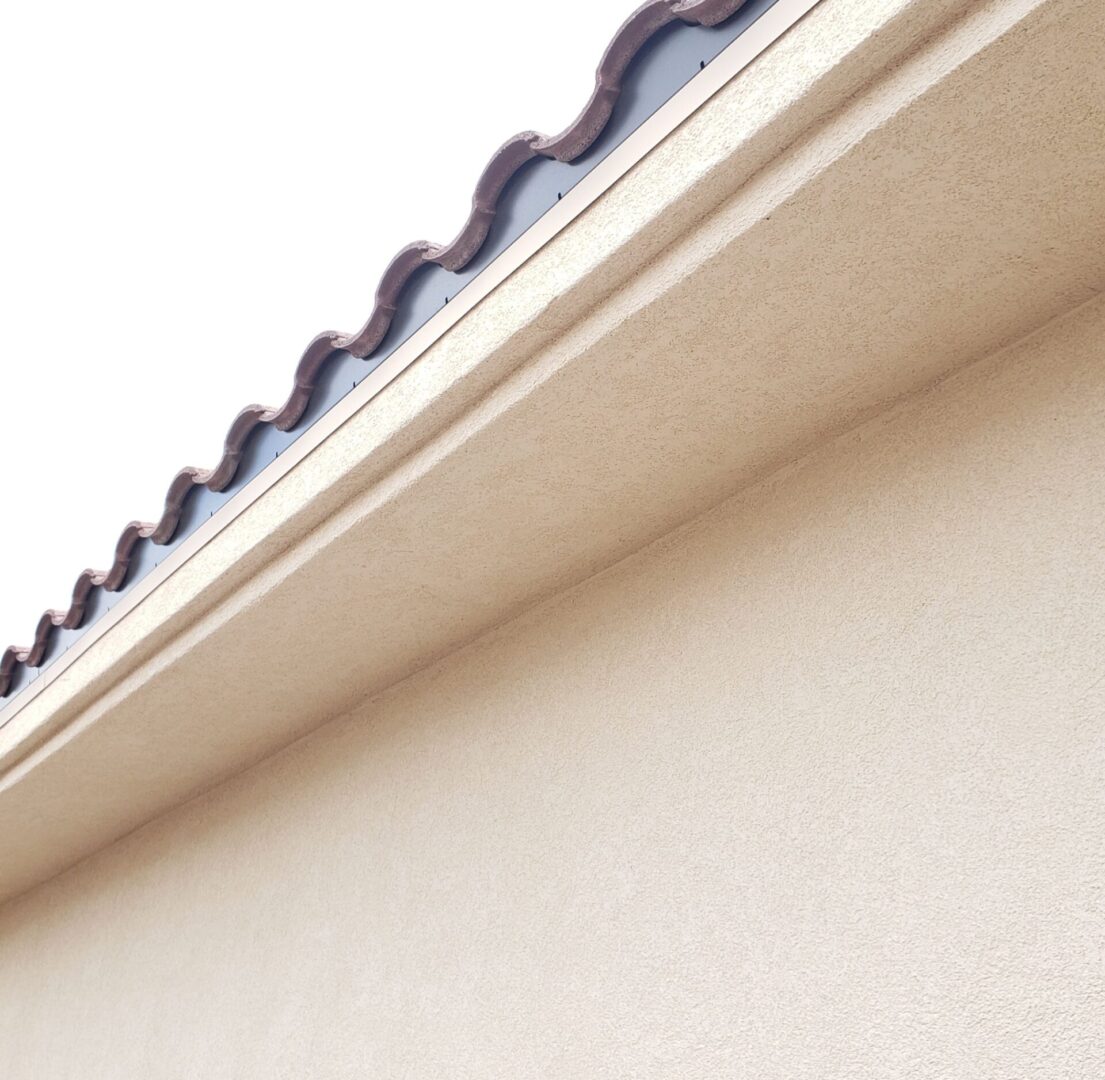 A close up of the gutter on a house